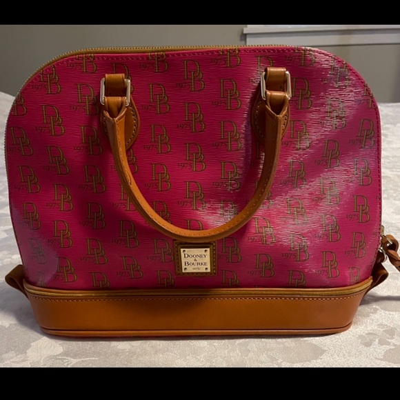 Dooney & Bourke Handbags - Dooney & Bourke Zip Zip Satchel in pink with the "DB 1975" logo pattern.